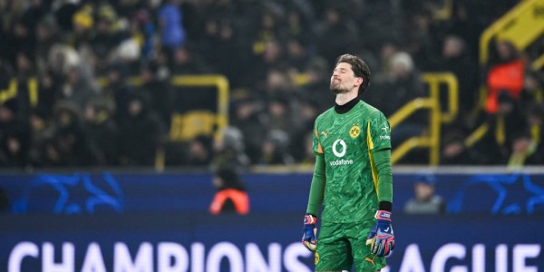 德甲激战：多特蒙德的坚持与拜仁的精准，科贝尔直言痛苦与希望并存